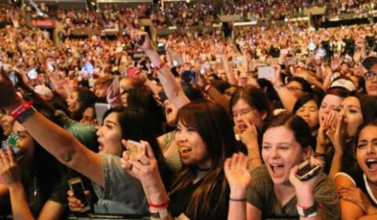 Enthusiastic female fans at concerts